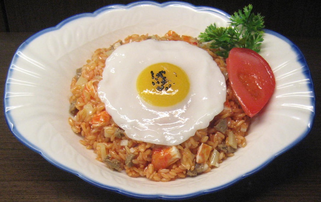Kimchi fried rice topped with a fried egg; an illustrative serving.